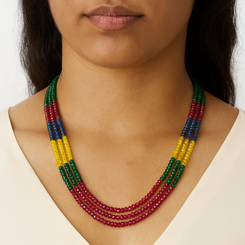 Colorful beaded necklace worn by a person against a neutral background