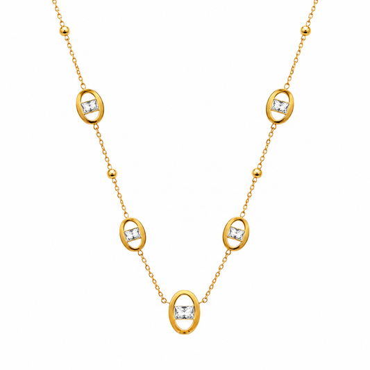 Gold necklace with diamond pendants on a white background