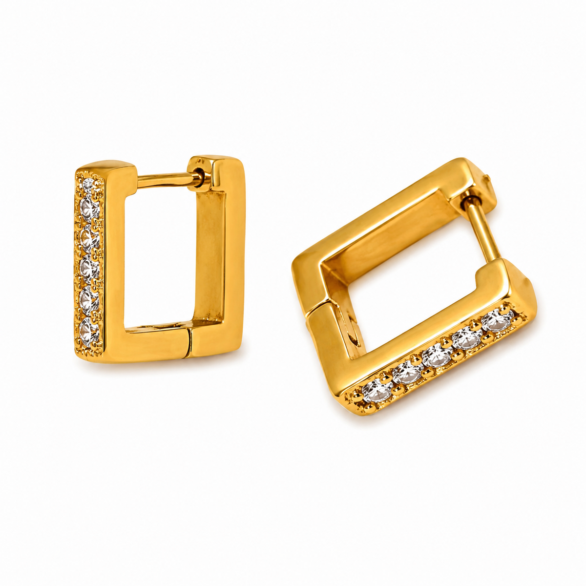 A pair of gold square huggie hoop earrings with a row of clear pavé-set stones along one side, shown on a plain white background.