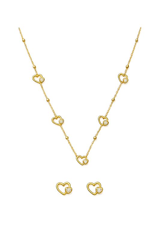 Gold necklace and earrings set on a transparent background