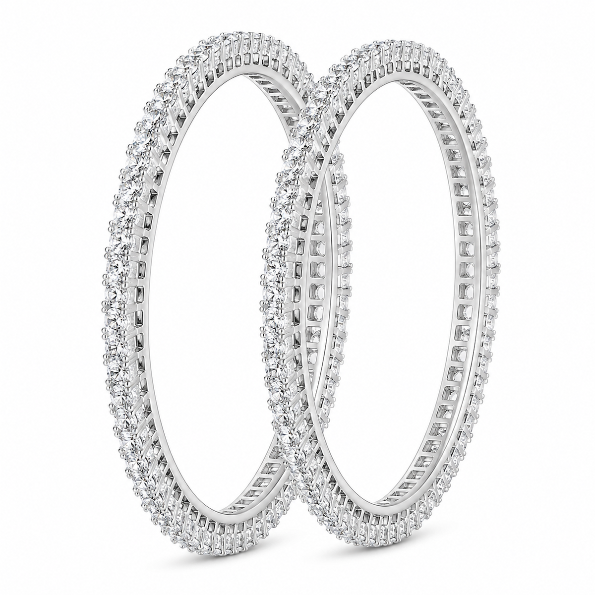 Two silver-toned eternity bangle bracelets, fully paved with small clear stones, displayed on a clean white background.