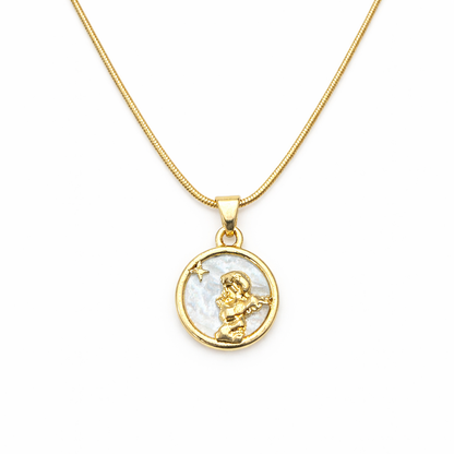 Silver pendant with a blue gemstone on a white background