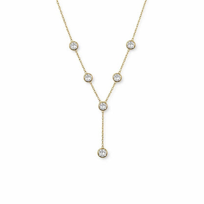 Gold necklace with diamond beads on a white background