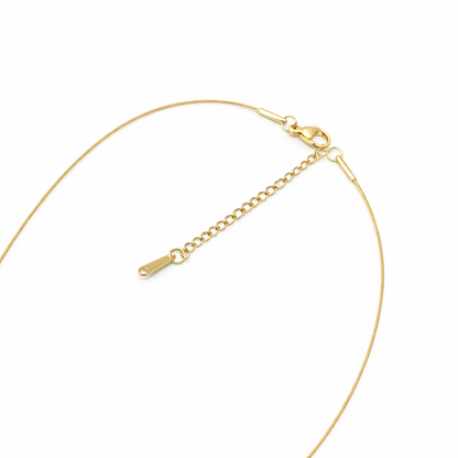 Gold necklace on a white background