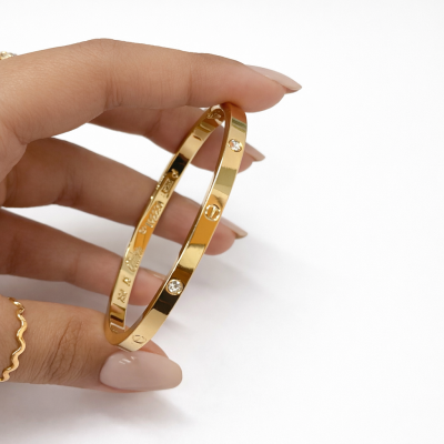 Gold-Tone Screw Motif Crystal Bracelet