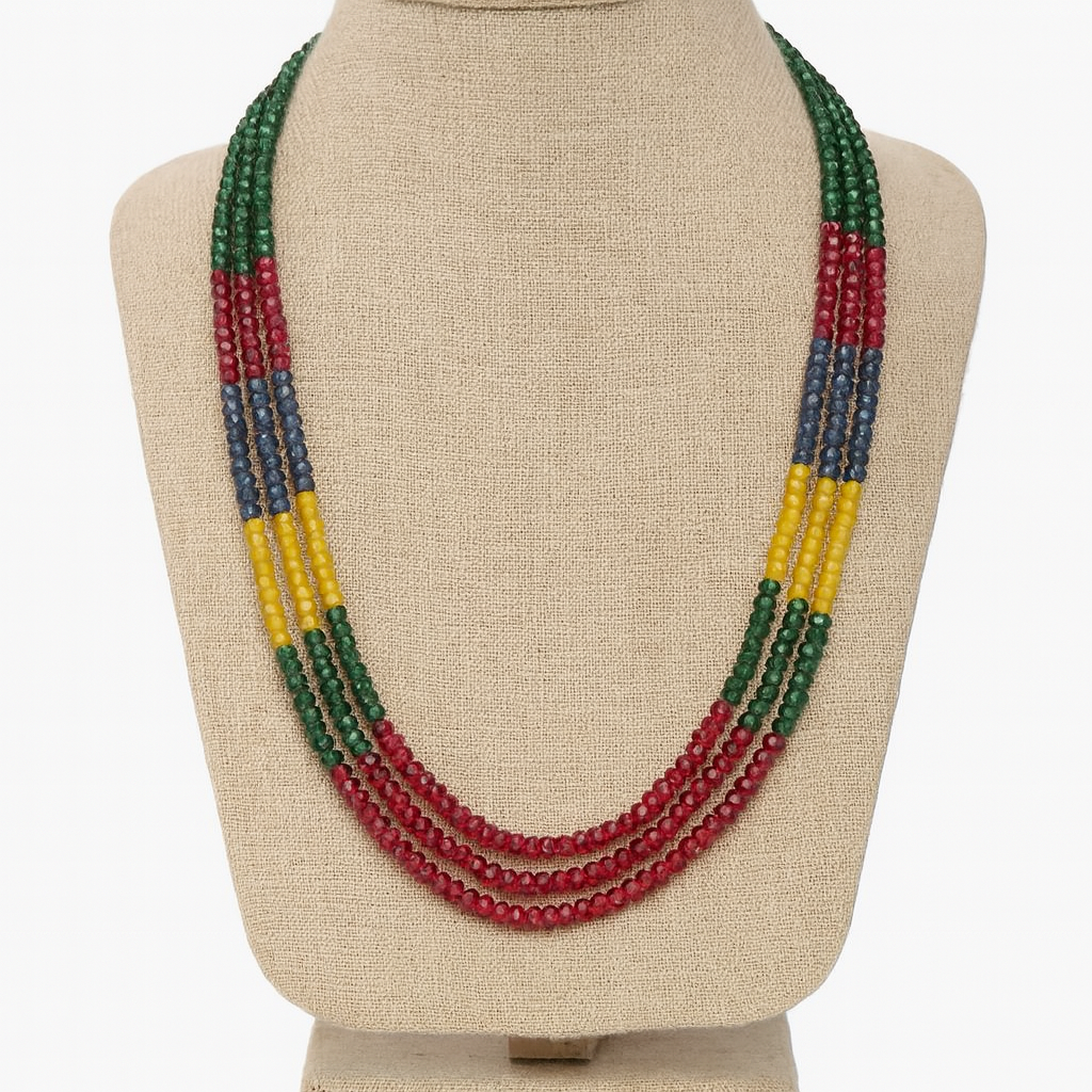 Colorful beaded necklace on a beige mannequin bust
