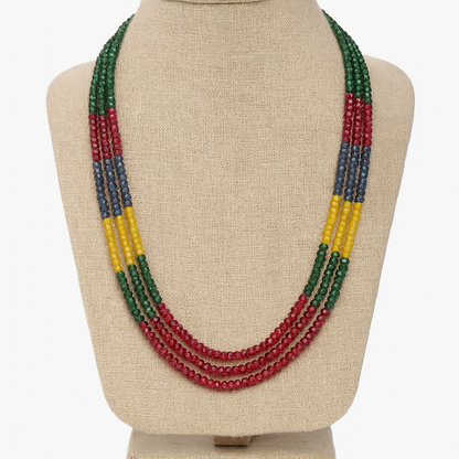 Colorful beaded necklace on a beige mannequin bust