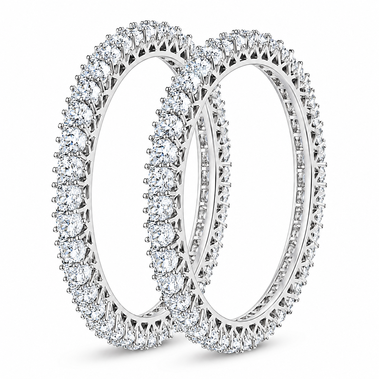 Two diamond eternity rings in silver-toned metal, shown overlapping on a clean white background.