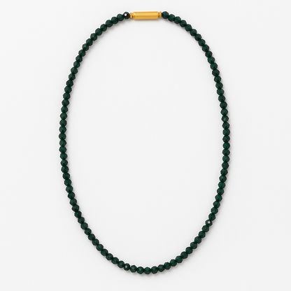 Green beaded necklace with a gold clasp on a white background