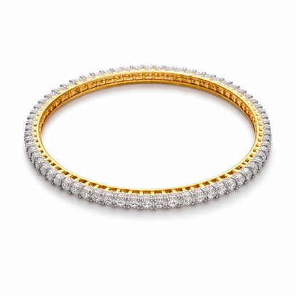 Gold and silver bracelet with diamonds on a white background