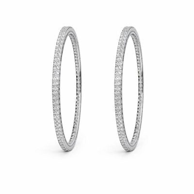 Pair of diamond eternity bands on a white background